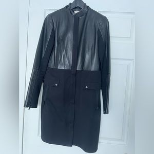 Woman Robert Rodriguez mixed media black leather with cotton coat.Size 6.Used.